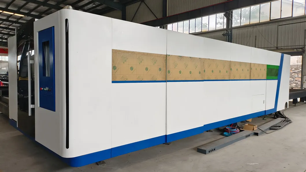 AC380V/50Hz/60Hz Power Supply Exchange Table Laser Cutting Machine With Enclosed Protective Cover 3000W Laser Power 0
